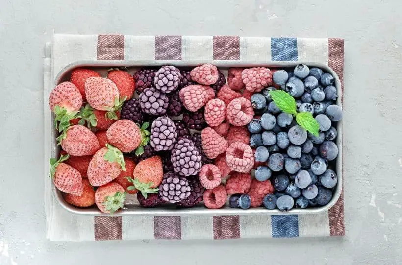 frozen berries in a metal tray
