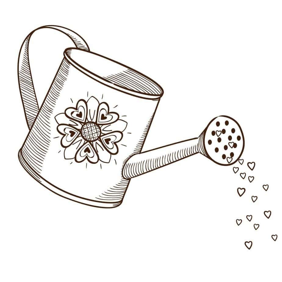 Watering can with flowers.